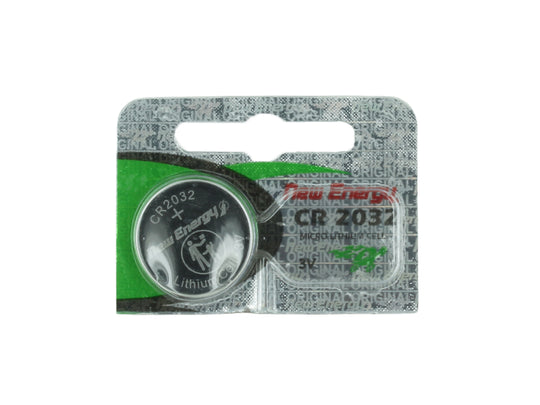 CR2032 lithium battery in a clear packaging on a white background