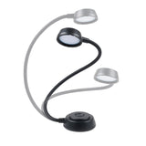 Flexible reading lamp demonstrating flexibility on a white background