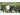 Acebeam X50 High Intensity USB-C Rechargeable Handheld Searchlight - Sitting in a Puddle