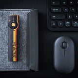 Olight Arkfeld Pro Rechargeable LED Flashlight - 1300 Lumens - Cool White or Neutral White LED - 365nm UV - 520nm Green Laser - Uses Built-in 1500mAh Li-Poly Battery Pack - Black and Additional Colors