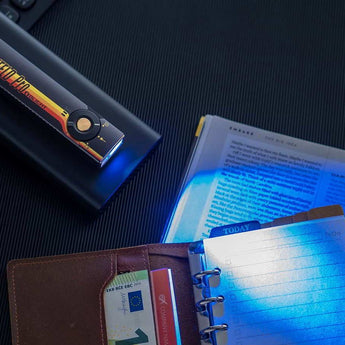 Olight Arkfeld Pro Rechargeable LED Flashlight - 1300 Lumens - Cool White or Neutral White LED - 365nm UV - 520nm Green Laser - Uses Built-in 1500mAh Li-Poly Battery Pack - Black and Additional Colors