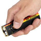 Olight Arkfeld Pro Rechargeable LED Flashlight - 1300 Lumens - Cool White or Neutral White LED - 365nm UV - 520nm Green Laser - Uses Built-in 1500mAh Li-Poly Battery Pack - Black and Additional Colors