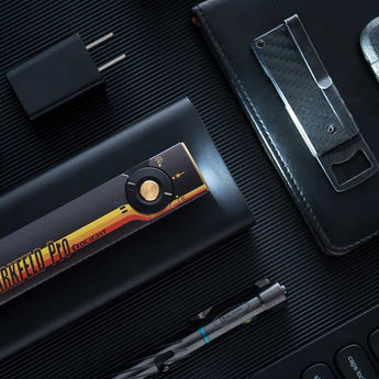 Olight Arkfeld Pro Rechargeable LED Flashlight - 1300 Lumens - Cool White or Neutral White LED - 365nm UV - 520nm Green Laser - Uses Built-in 1500mAh Li-Poly Battery Pack - Black and Additional Colors