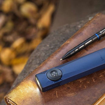 Olight Arkfeld Ultra Rechargeable LED Flashlight - 1400 Lumens - Cool or Neutral White - 365nm UV - Green Laser - Uses Built-in 1500mAh Li-Poly Battery Pack - Multiple Color Options