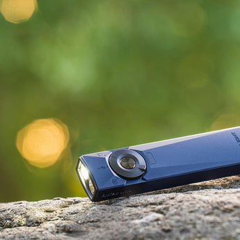 Olight Arkfeld Ultra Rechargeable LED Flashlight - 1400 Lumens - Cool or Neutral White - 365nm UV - Green Laser - Uses Built-in 1500mAh Li-Poly Battery Pack - Multiple Color Options