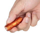 Olight iTHX Rechargeable LED Keychain Flashlight - 180 Lumens - Uses Built-in 130mAh Li-ion Battery Pack - Pumpkin Orange or Orange Feathers