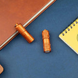 Olight iTHX Rechargeable LED Keychain Flashlight - 180 Lumens - Uses Built-in 130mAh Li-ion Battery Pack - Pumpkin Orange or Orange Feathers