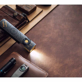 Olight Arkfeld Pro Rechargeable LED Flashlight - 1300 Lumens - Cool White or Neutral White LED - 365nm UV - 520nm Green Laser - Uses Built-in 1500mAh Li-Poly Battery Pack - Black and Additional Colors