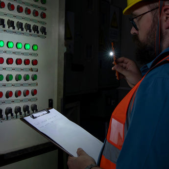 Olight O'Pen 3 LED Pen Light- Side Light Being Used in Dark Room