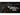 Olight Sigurd 2-in-1 Angled Grip Rechargeable LED Weapon Light - 1450 Lumens - Includes Built-in 2400mAh Li-Poly Battery Pack - Black or Desert Tan