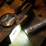 Olight Arkfeld Pro Rechargeable LED Flashlight - 1300 Lumens - Cool White or Neutral White LED - 365nm UV - 520nm Green Laser - Uses Built-in 1500mAh Li-Poly Battery Pack - Black and Additional Colors