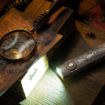 Olight Arkfeld Pro Rechargeable LED Flashlight - 1300 Lumens - Cool White or Neutral White LED - 365nm UV - 520nm Green Laser - Uses Built-in 1500mAh Li-Poly Battery Pack - Black and Additional Colors