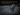 Product with composite material on a dark surface, highlighting durability.