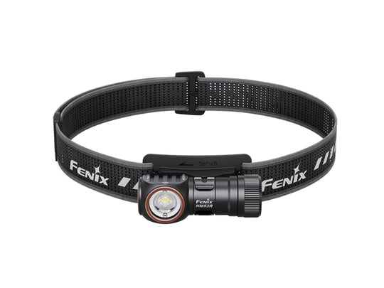 Fenix headlamp with black strap on a white background