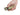 Olight ArkPro Ultra Rechargeable LED Flashlight - Held in Hand