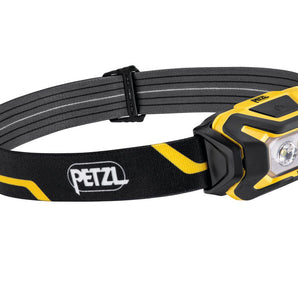 Black and yellow headlamp with Petzl logo on a white background