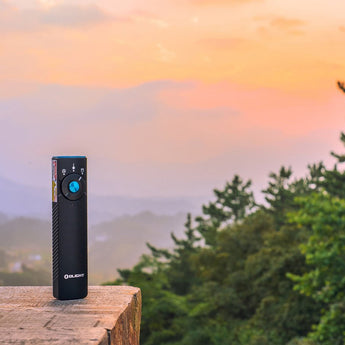 Olight Arkfeld Pro Rechargeable LED Flashlight - 1300 Lumens - Cool White or Neutral White LED - 365nm UV - 520nm Green Laser - Uses Built-in 1500mAh Li-Poly Battery Pack - Black and Additional Colors