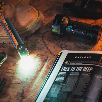 Olight Arkfeld Pro Rechargeable LED Flashlight - 1300 Lumens - Cool White or Neutral White LED - 365nm UV - 520nm Green Laser - Uses Built-in 1500mAh Li-Poly Battery Pack - Black and Additional Colors