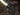 Flashlight submerged in water with text about IP68 rating