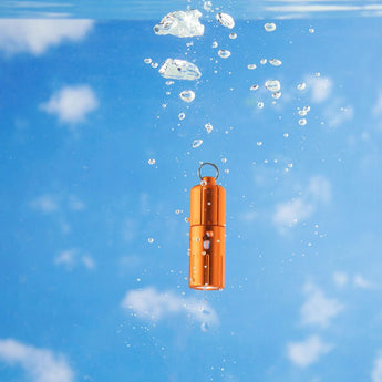 Olight iTHX Rechargeable LED Keychain Flashlight - 180 Lumens - Uses Built-in 130mAh Li-ion Battery Pack - Pumpkin Orange or Orange Feathers