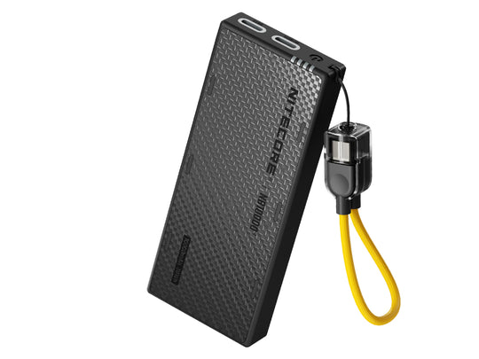 Black nitecore power bank with USB cable on a white background