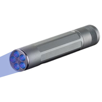 nite ize inova x5 uv flashlight angled down and to the left