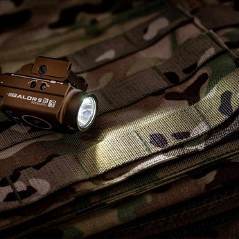 Olight Baldr S BL Rechargeable Weapon Light with Blue Laser - 800 Lumens - Uses Built-In 380mAh Li-Poly Battery Pack - Black or Desert Tan