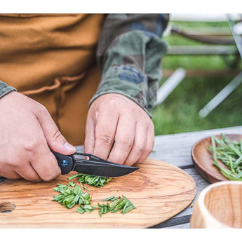 Olight Splint Folding Knife - Black - In Action - Chopping